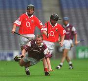 28 July 2002; Cathal Dervan of Galway in action against Mark Harrington, left, and David Murphy of Cork during the All-Ireland Minor Hurling Championship Quarter-Final match between Cork and Galway at Croke Park in Dublin. Photo by Ray McManus/Sportsfile