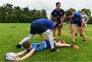 19 July 2017; Leinster academy player Ronan Kelleher coaches young players, from left, Jack Hennesy, Nicola Giralei and Elliot Sellers during the Bank of Ireland Leinster Rugby School of Excellence at Kings Hospital in Palmerstown, Dublin. Photo by Sam Barnes/Sportsfile