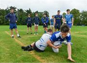 19 July 2017; Leinster academy players Caelan Doris, left, and Ronan Kelleher, second from right, watch on with attendees, during the Bank of Ireland Leinster Rugby School of Excellence at Kings Hospital in Palmerstown, Dublin. Photo by Sam Barnes/Sportsfile