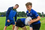 19 July 2017; Leinster academy player Conor Dean, right, coaches young players PJ Tiernan, left, and Sam Hamilton, during the Bank of Ireland Leinster Rugby School of Excellence at Kings Hospital in Palmerstown, Dublin. Photo by Sam Barnes/Sportsfile