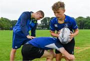 19 July 2017; Leinster academy player Conor Dean, right, coaches young players PJ Tiernan, left, and Sam Hamilton, during the Bank of Ireland Leinster Rugby School of Excellence at Kings Hospital in Palmerstown, Dublin. Photo by Sam Barnes/Sportsfile