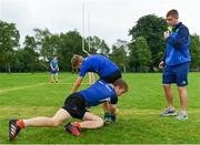 19 July 2017; Leinster academy player Conor Dean, coaches young players PJ Tiernan, left, and Sam Hamilton during the Bank of Ireland Leinster Rugby School of Excellence at Kings Hospital in Palmerstown, Dublin. Photo by Sam Barnes/Sportsfile