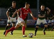 21 July 2017; Graham Kelly of St Patrick's Athletic in action against Conor Kenna, right, and John Sullivan of Bray Wanderers during the SSE Airtricity League Premier Division match between St Patrick's Athletic and Bray Wanderers at Richmond Park in Dublin. Photo by Piaras Ó Mídheach/Sportsfile