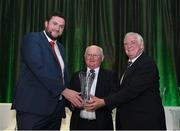 21 July 2017; Jimmy Corrigan, of Ballinahown FC, Athlone, Co. Westmeath, is presented with his John Sherlock award for services to football by Adrian Sherlock, left, and FAI President Tony Fitzgerald, right, at the FAI Communications Awards & Delegates Dinner at Hotel Kilkenny in Kilkenny. Photo by Seb Daly/Sportsfile