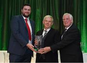21 July 2017; Patrick McDonnell, of Walshestown FC, Rinkinstown, Co. Louth, is presented with his John Sherlock award for services to football by Adrian Sherlock, left, and FAI President Tony Fitzgerald, right, at the FAI Communications Awards & Delegates Dinner at Hotel Kilkenny in Kilkenny. Photo by Seb Daly/Sportsfile