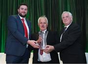 21 July 2017; Sean Murphy, of Nurney Villa FC, Carlow, Co. Carlow, is presented with his John Sherlock award for services to football by Adrian Sherlock, left, and FAI President Tony Fitzgerald, right, at the FAI Communications Awards & Delegates Dinner at Hotel Kilkenny in Kilkenny. Photo by Seb Daly/Sportsfile