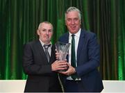21 July 2017; Conal Kavanagh, of Arranmore United FC, Arranmore, Co. Donegal, is presented with the Services to Football Club Merit Award on behalf of his club by FAI Chief Executive John Delaney at the FAI Communications Awards & Delegates Dinner at Hotel Kilkenny in Kilkenny. Photo by Seb Daly/Sportsfile