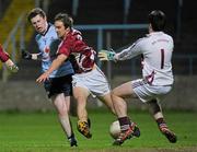 21 March 2012; Dublin's Jack McCaffrey shoots to score his side's second goal past Westmeath's Kevin Maguire and goalkeeper Eoin Carbery. Cadburys Leinster Under 21 Football Championship Semi-Final, Westmeath v Dublin, O'Moore Park, Portlaoise, Co. Laois. Picture credit: Matt Browne / SPORTSFILE