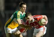 21 March 2012; Michael McKeown, Louth, in action against Graham Guilfoyle, Offaly. Cadburys Leinster Under 21 Football Championship Semi-Final, Offaly v Louth, Pairc Tailteann, Navan, Co. Meath. Picture credit: David Maher / SPORTSFILE