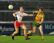21 March 2012; Niall Sludden, Tyrone, in action against Michael McEniff, Donegal. Cadburys Ulster Under 21 Football Championship Quarter-Final,Tyrone v Donegal, Tyrone v Donegal, Healy Park, Omagh, Co. Tyrone. Picture credit: Oliver McVeigh / SPORTSFILE