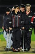 21 March 2012; Tyrone forward Ronan O'Neill, centre, makes his way back to the team bench on crutches after suffering a serious knee injury in training on Monday night. Allianz Football League. Cadburys Ulster Under 21 Football Championship Quarter-Final,Tyrone v Donegal, Tyrone v Donegal,Healy Park, Omagh, Co. Tyrone. Picture credit: Oliver McVeigh / SPORTSFILE