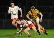 21 March 2012; Luke Keeney, Donegal, in action against Niall Sludden, Tyrone. Cadburys Ulster Under 21 Football Championship Quarter-Final,Tyrone v Donegal, Tyrone v Donegal,Healy Park, Omagh, Co. Tyrone. Picture credit: Oliver McVeigh / SPORTSFILE