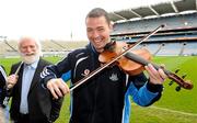 21 March 2012; Dublin hurler Michael Carton with members of The Dubliners, including John Sheahan, at the announcement that The Dubliner's will perform on the final night of the Dublin Spring Series in Croke Park this weekend. Croke Park, Dublin. Picture credit: Brendan Moran / SPORTSFILE