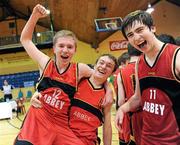 22 March 2012; Abbey Grammar players, from left, Ross O'Hanlon, Cathal Donnelly and Peter O'Hagan celebrate after the final whistle. U16C Boys - All-Ireland Schools League Finals 2012, Abbey Grammar, Newry v High School Clonmel, Tipperary, National Basketball Arena, Tallaght, Dublin. Picture credit: Matt Browne / SPORTSFILE