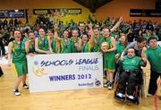 22 March 2012; Clonaslee Vocational School captain Meaghan Dunne lifts the cup as her team-mates celebrate. U16C Girls - All-Ireland Schools League Finals 2012, Aquinas Grammar, Belfast v Clonaslee Vocational School, Laois, National Basketball Arena, Tallaght, Dublin. Picture credit: Matt Browne / SPORTSFILE