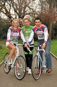 22 March 2012; Today the 2012 An Post Cycle Series in association with the Irish Sports Council was offically launched. In attendance at the launch are model Sarah McGovern, left, An Post team manager Sean Kelly and Cork hurler Seán Óg Ó hAilpín, right. Merrion Square, Dublin. Picture credit: Barry Cregg / SPORTSFILE