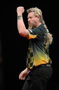22 March 2011; Simon Whitlock during his match against Andy Hamilton during the McCoy's Premier League Darts Tournament. O2, Dublin. Picture credit: Stephen McCarthy / SPORTSFILE