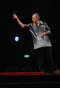 22 March 2011; Phil Taylor in action against James Wade during the McCoy's Premier League Darts Tournament. O2, Dublin. Picture credit: Stephen McCarthy / SPORTSFILE