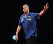 22 March 2011; Kevin Painter reacts during his match against Adrian Lewis during the McCoy's Premier League Darts Tournament. O2, Dublin. Picture credit: Paul Murphy / SPORTSFILE