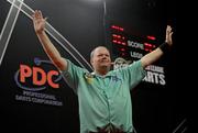 22 March 2011; Raymond van Barneveld during his match against Gary Anderson at the McCoy's Premier League Darts Tournament. O2, Dublin. Picture credit: Stephen McCarthy / SPORTSFILE