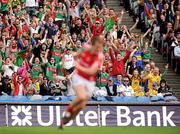 21 August 2011; Mayo supporters cheer on their side during the game. GAA Football All-Ireland Senior Championship Semi-Final, Mayo v Kerry, Croke Park, Dublin. Picture credit: Brendan Moran / SPORTSFILE