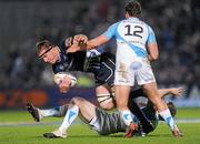 23 March 2012; Brad Thorn, Leinster, is tackled by Andrew Bishop, and Ashley Beck, 12, Ospreys. Celtic League, Leinster v Ospreys, RDS, Ballsbridge, Dublin. Picture credit: Pat Murphy / SPORTSFILE