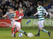 23 March 2012; Glen Cronin, Shelbourne, in action against Stephen Rice, left, and Gary Twigg, Shamrock Rovers. Airtricity League Premier Division, Shamrock Rovers v Shelbourne, Tallaght Stadium, Tallaght, Co. Dublin. Picture credit: Brian Lawless / SPORTSFILE