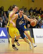 23 March 2012; Robert Lynch, UL Eagles, in action against James Donnelly, DCU Saints. Nivea For Men’s SuperLeague Final 2012, UL Eagles v DCU Saints, National Basketball Arena, Tallaght, Dublin. Picture credit: Brendan Moran / SPORTSFILE