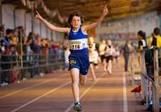 24 March 2012; Aaron McGlynn, Finn Valley AC, Co. Donegal, crosses the line to win the U-13 Boy's 600m Final during the Woodie’s DIY AAI Juvenile Indoor Championships of Ireland. Nenagh Indoor Arena, Nenagh, Co. Tipperary. Picture credit: Barry Cregg / SPORTSFILE