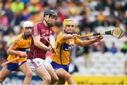 22 July 2017; Enda Fahey of Galway scores a goal, in the 54th minute, despite the pressure from Clare's Bradley Higgins during the Electric Ireland GAA Hurling All-Ireland Minor Championship Quarter-Final between Clare and Galway at Páirc Uí Chaoimh in  Cork. Photo by Ray McManus/Sportsfile
