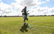 22 July 2017; Donaghmore/Ashbourne Gaa groundsman John Williams puts the sideline flags out ahead of the TG4 Senior All Ireland Championship Preliminary match between Cavan and Laois in Ashbourne, Co. Meath. Photo by Barry Cregg/Sportsfile