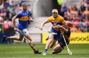 22 July 2017; Aaron Cunningham of Clare goes past Tipperary goalkeeper Daragh Mooney on his way to scoring his side's second goal during the GAA Hurling All-Ireland Senior Championship Quarter-Final match between Clare and Tipperary at Páirc Uí Chaoimh in Cork. Photo by Stephen McCarthy/Sportsfile