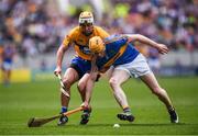 22 July 2017; Donagh Maher of Tipperary in action against Conor McGrath of Clare during the GAA Hurling All-Ireland Senior Championship Quarter-Final match between Clare and Tipperary at Páirc Uí Chaoimh in Cork. Photo by Stephen McCarthy/Sportsfile