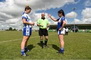 22 July 2017; Cavan captain Sinead Greene points towards the end her team decided to play after winning the coin toss over Laois captain Aileen Healy with referee Gavin Corrigan ahead of the game. TG4 Senior All Ireland Championship Preliminary match between Cavan and Laois in Ashbourne, Co. Meath.  Photo by Barry Cregg/Sportsfile