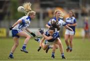 22 July 2017; Sheila Reilly of Cavan in action against Laura Nerney, left, and Rachel Williams of Laois during the TG4 Senior All Ireland Championship Preliminary match between Cavan and Laois in Ashbourne, Co. Meath.  Photo by Barry Cregg/Sportsfile