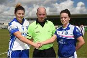 22 July 2017; Laois captain Aileen Healy, left, shakes hands with Cavan captain Sinead Greene with referee Gavin Corrigan ahead of the game. TG4 Senior All Ireland Championship Preliminary match between Cavan and Laois in Ashbourne, Co. Meath.  Photo by Barry Cregg/Sportsfile