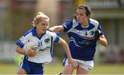 22 July 2017; Caoimhe Simms of Laois in action against Sheila Reilly of Cavan during the TG4 Senior All Ireland Championship Preliminary match between Cavan and Laois in Ashbourne, Co. Meath.  Photo by Barry Cregg/Sportsfile
