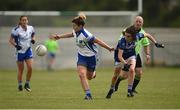 22 July 2017; Aileen O'Loughlin of Laois in action against Sheila Reilly of Cavan during the TG4 Senior All Ireland Championship Preliminary match between Cavan and Laois in Ashbourne, Co. Meath.  Photo by Barry Cregg/Sportsfile