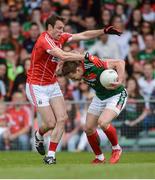 22 July 2017; Andy Moran of Mayo in action against James Loughrey of Cork during the GAA Football All-Ireland Senior Championship Round 4A match between Cork and Mayo at Gaelic Grounds in Co. Limerick. Photo by Piaras Ó Mídheach/Sportsfile