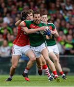 22 July 2017; Tom Parsons of Mayo in action against Tomás Clancy of Cork during the GAA Football All-Ireland Senior Championship Round 4A match between Cork and Mayo at Gaelic Grounds in Co. Limerick. Photo by Piaras Ó Mídheach/Sportsfile