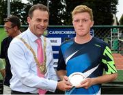 22 July 2017; Ryan James Storrie receives a runners up presentation from Cathaoirleach Tom Murphy, Dún Laoghaire Rathdown City Council after the Dún Laoghaire Rathdown Men's International Tennis Championships Final at Carrickmines Tennis Club in Dublin. Photo by Barry Cronin/Sportsfile
