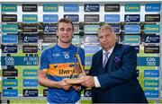 22 July 2017; John McGrath of Tipperary receiving the Man of the Match trophy from Matthias Muller, General Manager of Abbey Court Hotel & Spa, a Bord Gais Energy customer, at the GAA Hurling All-Ireland Senior Championship Quarter-Final match between Clare and Tipperary at Páirc Uí Chaoimh in Co. Cork. Photo by Cody Glenn/Sportsfile