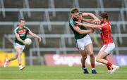 22 July 2017; Eoin Cadogan of Cork tangles with Aidan O'Shea of Mayo during the GAA Football All-Ireland Senior Championship Round 4A match between Cork and Mayo at Gaelic Grounds in Co. Limerick. Photo by Piaras Ó Mídheach/Sportsfile