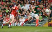 22 July 2017; Andy Moran of Mayo gets past James Loughrey of Cork during the GAA Football All-Ireland Senior Championship Round 4A match between Cork and Mayo at Gaelic Grounds in Co. Limerick. Photo by Piaras Ó Mídheach/Sportsfile