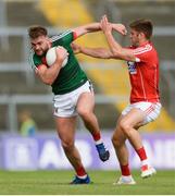 22 July 2017; Aidan O'Shea of Mayo in action against Eoin Cadogan of Cork during the GAA Football All-Ireland Senior Championship Round 4A match between Cork and Mayo at Gaelic Grounds in Co. Limerick. Photo by Piaras Ó Mídheach/Sportsfile