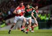 22 July 2017; Donncha O'Connor of Cork in action against Ger Cafferkey of Mayo during the GAA Football All-Ireland Senior Championship Round 4A match between Cork and Mayo at Gaelic Grounds in Co. Limerick. Photo by Piaras Ó Mídheach/Sportsfile