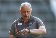 22 July 2017; Cork manager Peadar Healy checks his watch during the GAA Football All-Ireland Senior Championship Round 4A match between Cork and Mayo at Gaelic Grounds in Co. Limerick. Photo by Piaras Ó Mídheach/Sportsfile