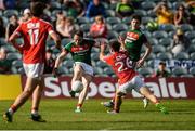 22 July 2017; Paddy Durcan of Mayo scores a point late in the second half, despite the efforts of Stephen Cronin of Cork, to put Mayo in the lead during the GAA Football All-Ireland Senior Championship Round 4A match between Cork and Mayo at Gaelic Grounds in Co. Limerick. Photo by Piaras Ó Mídheach/Sportsfile