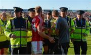 22 July 2017; Cork selector Billy Sheehan has words with referee Ciarán Branagan after the game as he is assisted from the field by members of An Garda Síochána after the GAA Football All-Ireland Senior Championship Round 4A match between Cork and Mayo at Gaelic Grounds in Co. Limerick. Photo by Piaras Ó Mídheach/Sportsfile