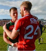 22 July 2017; Cillian O'Connor of Mayo with Ruairí Deane of Cork after the GAA Football All-Ireland Senior Championship Round 4A match between Cork and Mayo at Gaelic Grounds in Co. Limerick. Photo by Piaras Ó Mídheach/Sportsfile